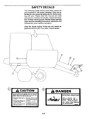 Safety decals and machine diagram for a construction vehicle on a white background